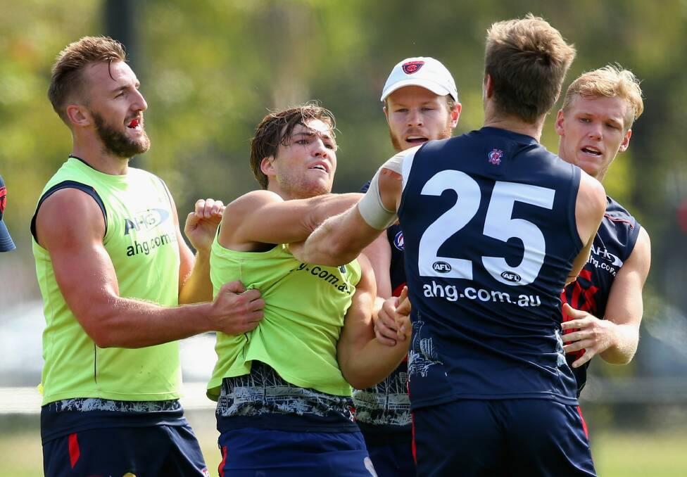 It's getting heated: Jack Viney and Tom McDonald clash at training. Photo: Getty Images