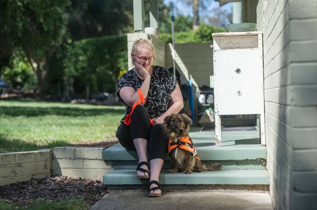 Amanda Sullivan, who was was born deaf, with her new hearing dog, Daphne.  Photo: Karleen Minney