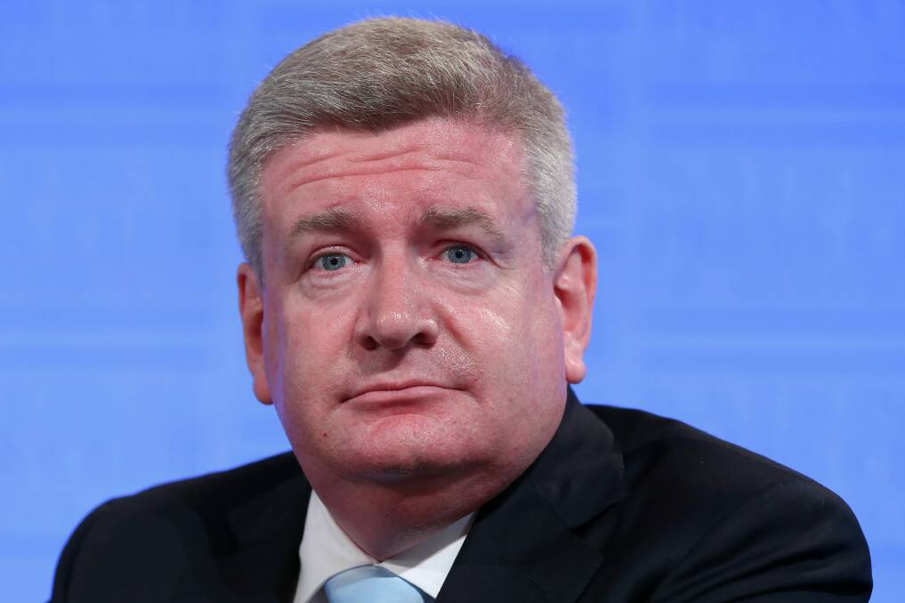 Communications Minister Mitch Fifield is reportedly considering a ban on gambling ads. Photo: Alex Ellinghausen