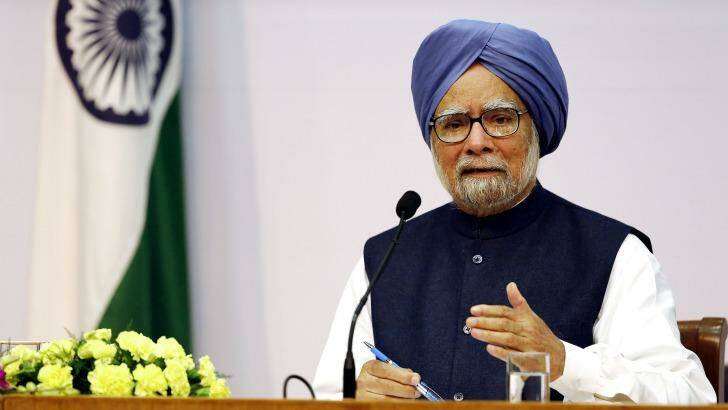 Indian Prime Minister Manmohan Singh announces that he will step down after elections this year at a press conference in New Delhi.   Photo: AFP