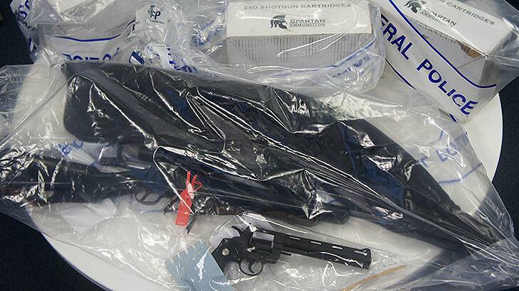 Police seized firearms and ammunition in two raids across Canberra.