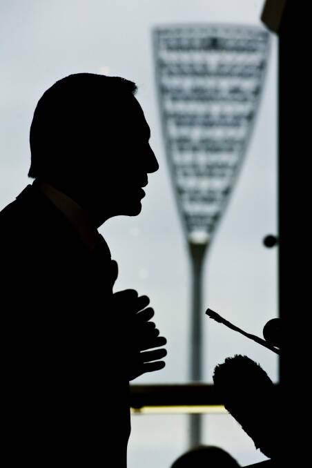 A silhouetted dignitary at Manuka Oval. Photo: Jay Cronan