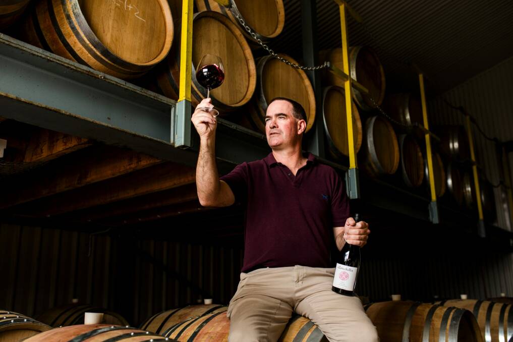 Clonakilla winemaker Tim Kirk with his Syrah wine.  Photo: Jamila Toderas