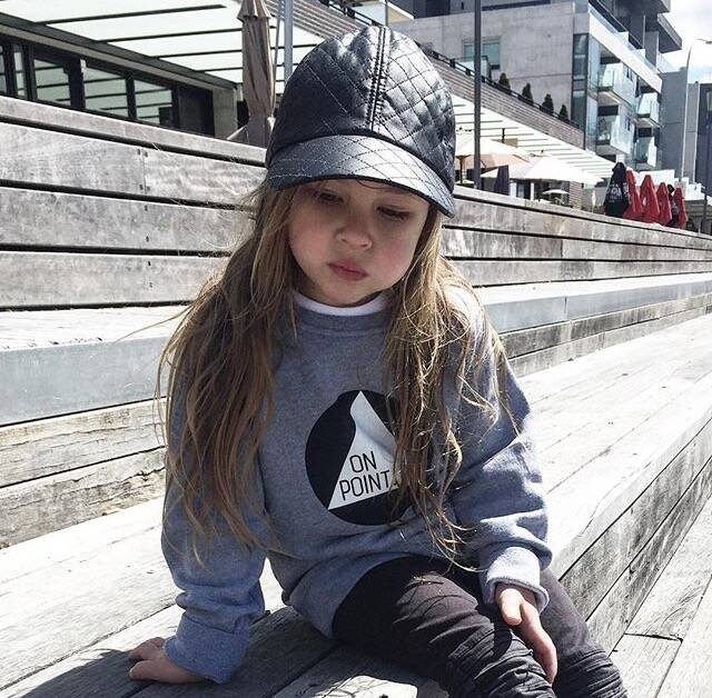 Four-year-old Riley Freeman (with a mouth full of marshmallows) models the label's minimalist fashion. Photo: Instagram