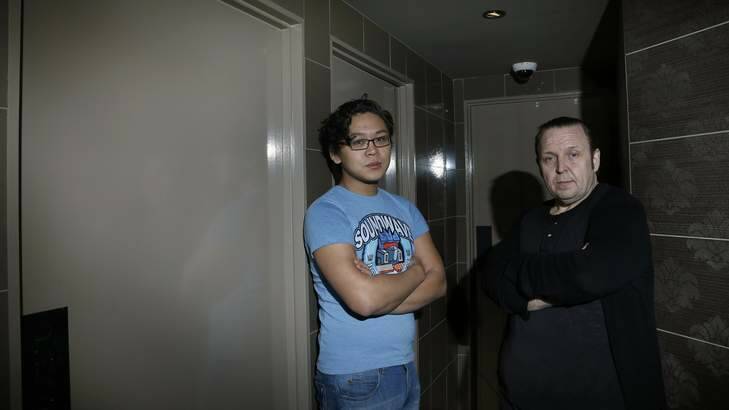 No signs ... Barcode Lounge and Bar staff member Maz Wakamatsu and owner Ian Goudie in front of the bar's toilets. Photo: Jeffrey Chan