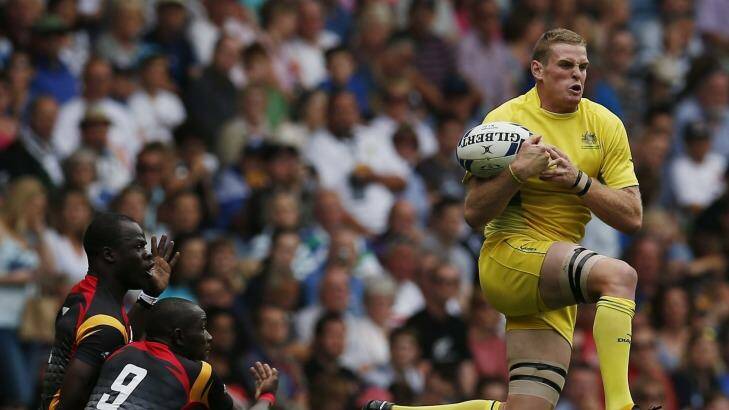 Tom Cusack in action for Australia at the Commonwealth Games. Photo: Getty Images