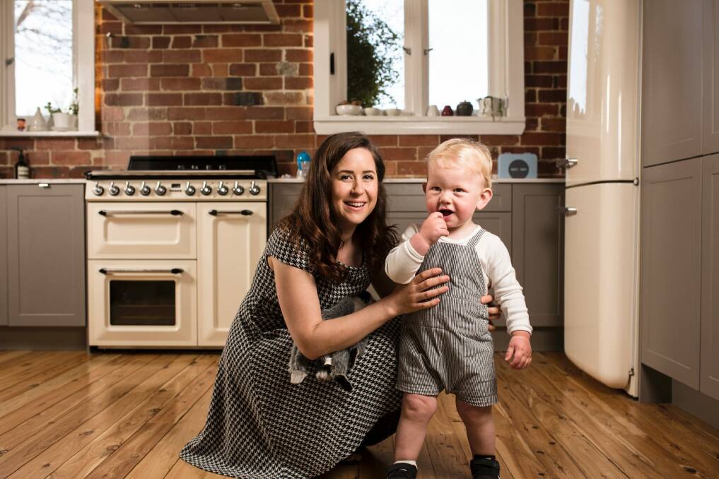 Owner of nanny agency GLK Nannies, Georgie King, 26, and her client, 15-month-old Harry. Photo: Jamila Toderas