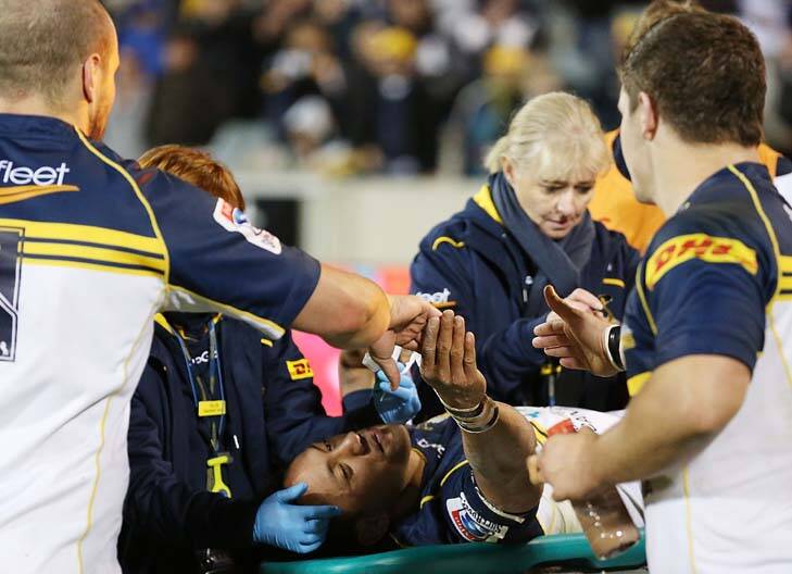 End of season &#8230; Christian Lealiifano being stretchered off. Photo: Getty Images