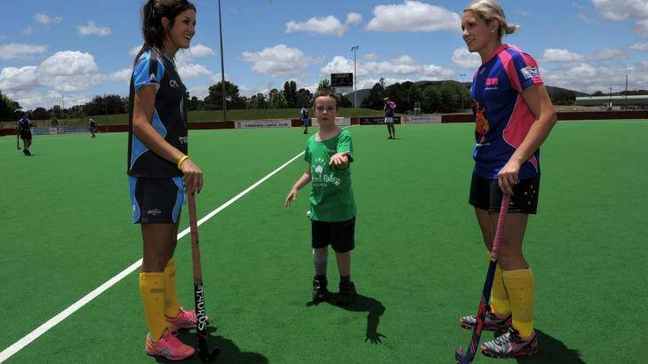 Canberra's Hockeyroos players Anna Flanagan, left, and Edwina Bone, return for the Strikers in this year's Australian Hockey League. Photo: Graham Tidy