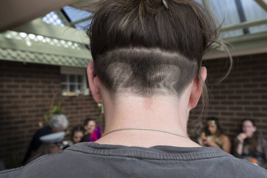  Kelsey Griffin's wife Erin has her number shaved into the back of her head. Photo: Sitthixay Ditthavong
