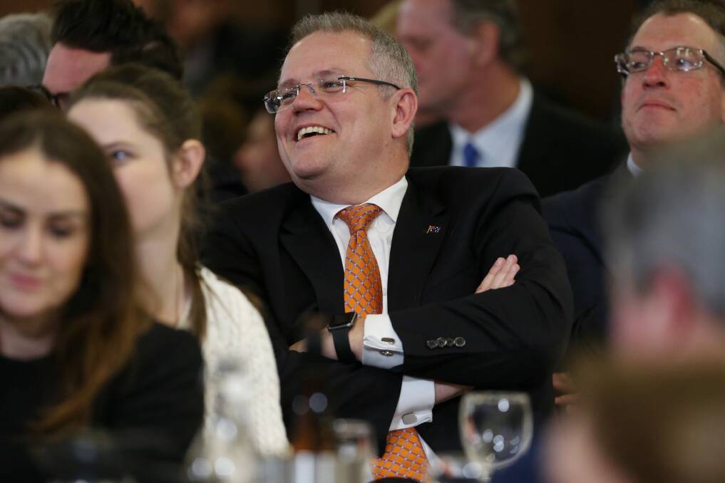 Treasurer Scott Morrison listens to Mr Turnbull at the National Press Club. Photo: Andrew Meares