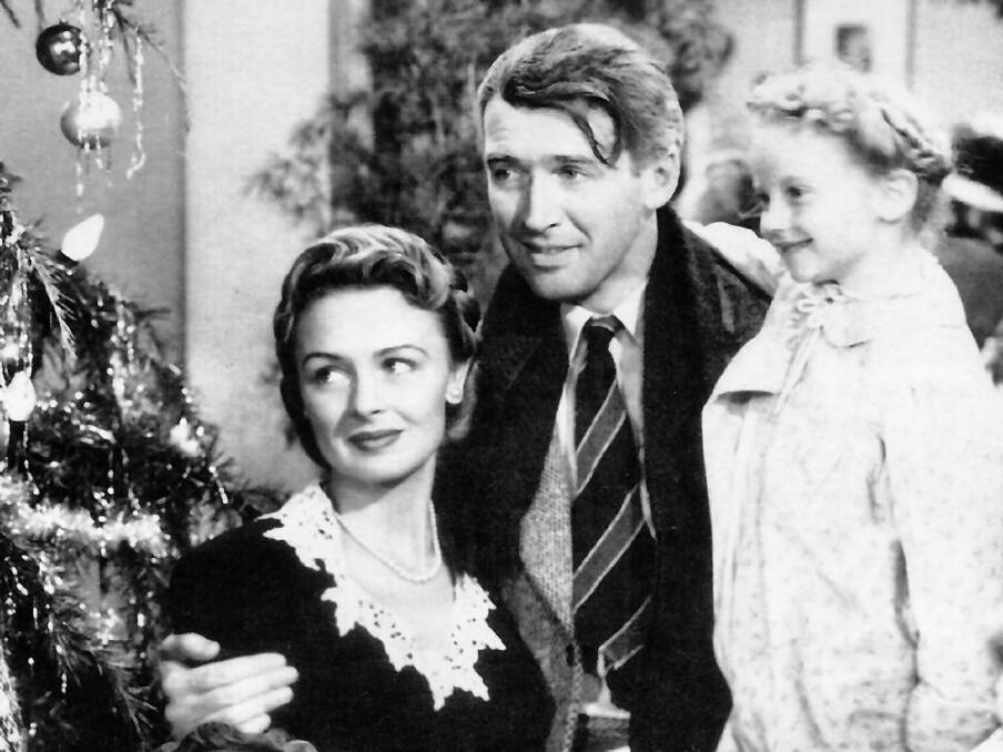 James Stewart, centre, plays George Bailey in <i<It's a Wonderful Life</i>. Photo: Supplied