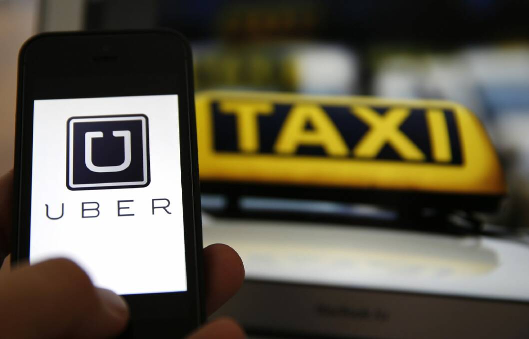 The government has warned the taxi industry on the eve of strike action that it cannot stop Uber's arrival. 