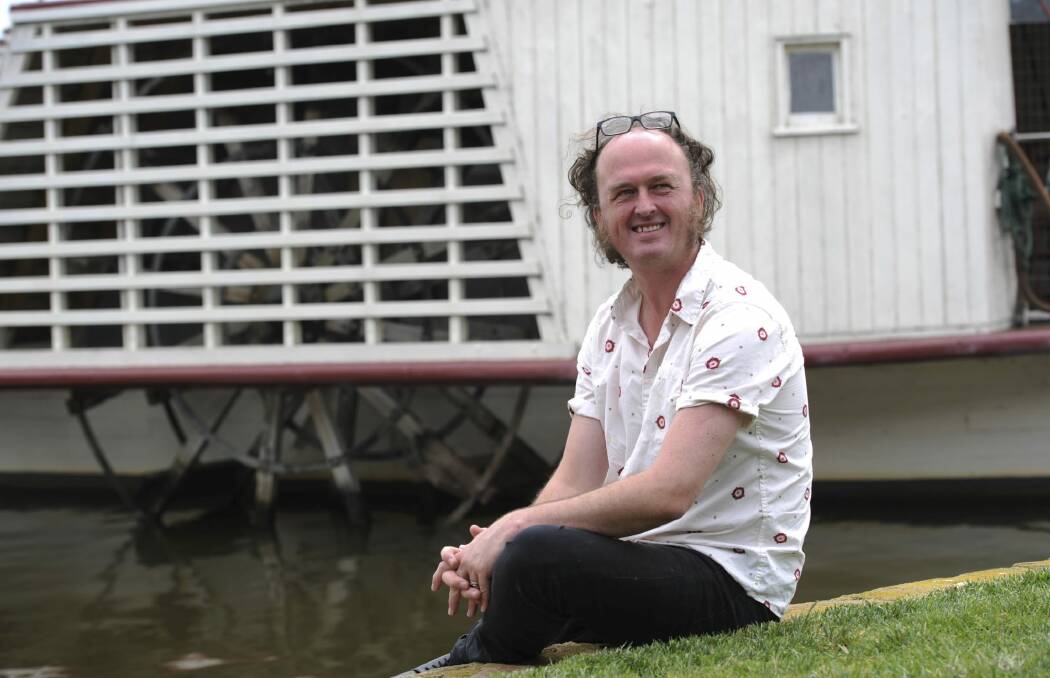 Artist in residence at the National Museum of Australia, Vic
McEwan of Naranderra NSW, in front of the paddle steamer Enterprise. Photo: Graham Tidy