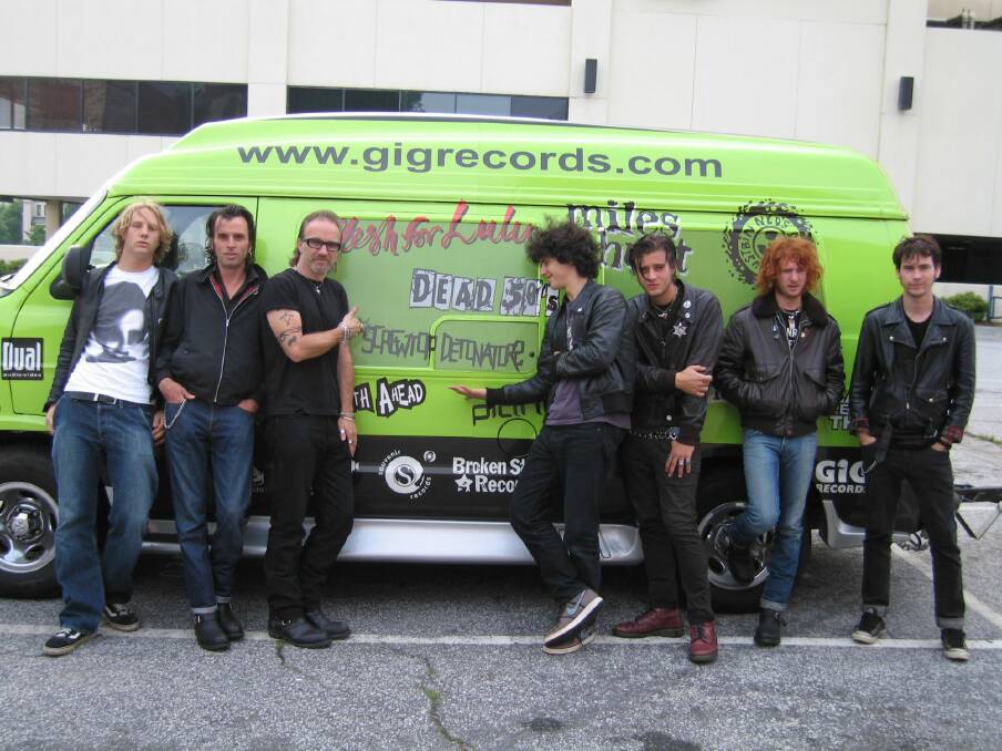 The 2005 USA OR BUST tour party in South Carolina with the van provided by Gig Records before the last gig of the tour. From left,Mat de Koning (director, Meal Tickets), Dave Kavanagh (then manager of the Screwtop Detonators), Pip McMullen (tour manager), with band members Charlie Austen, Lee French, Ben Ward, Mitch Long. Photo: Andy White