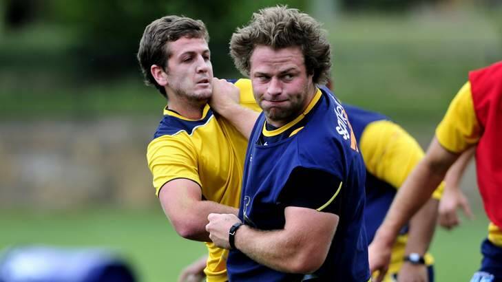 Brumbies front rower Dan Palmer, front, might be disagreeing with teammate Ian Prior on the nature of consciousness. Photo: Melissa Adams