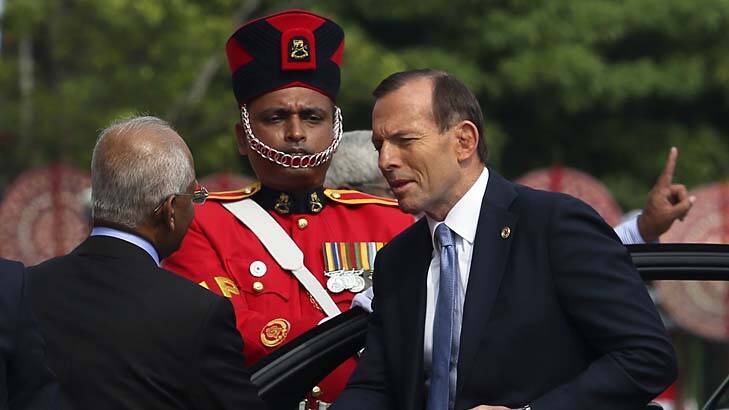 Pomp and circumstance: Tony Abbott arrives at the Commonwealth Heads of Government Meeting opening ceremony in Columbo. Photo: Reuters