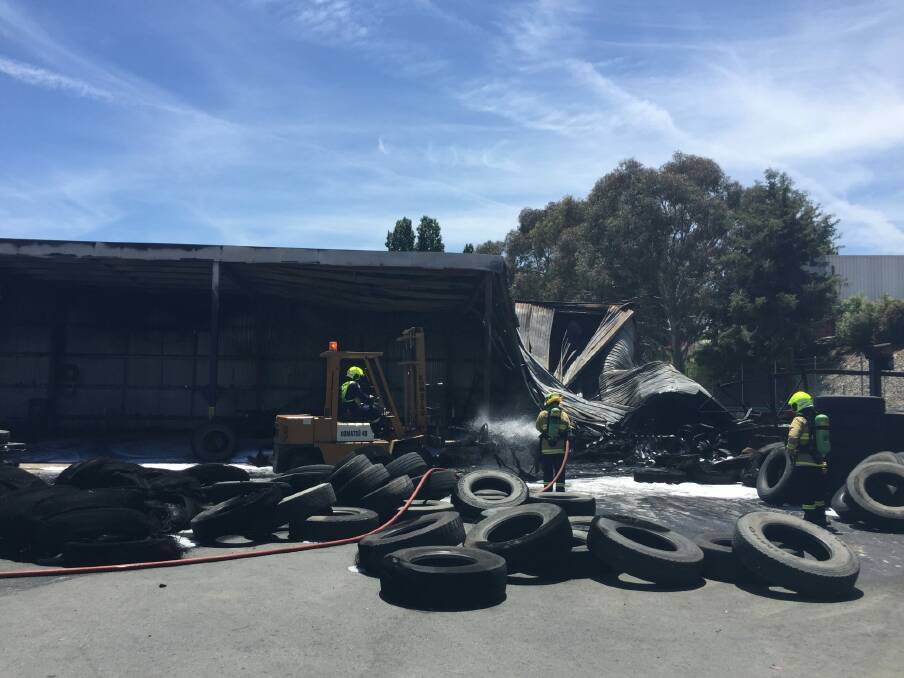 Firefighters are mopping up after a fire at a tyre yard in Queanbeyan. Photo: Katie Burgess