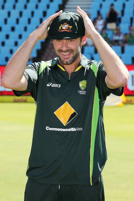 Top of the order: Alex Doolan receives his Baggy Green before making his Test debut against South Africa in February 2014. Doolan will play for Tasmania against the ACT Comets on Monday. Photo: Morne de Klerk