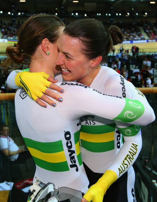 Rebecca Wiasak of Australia celebrates winning gold with bronze medalist Amy Cure. Photo: Getty Images