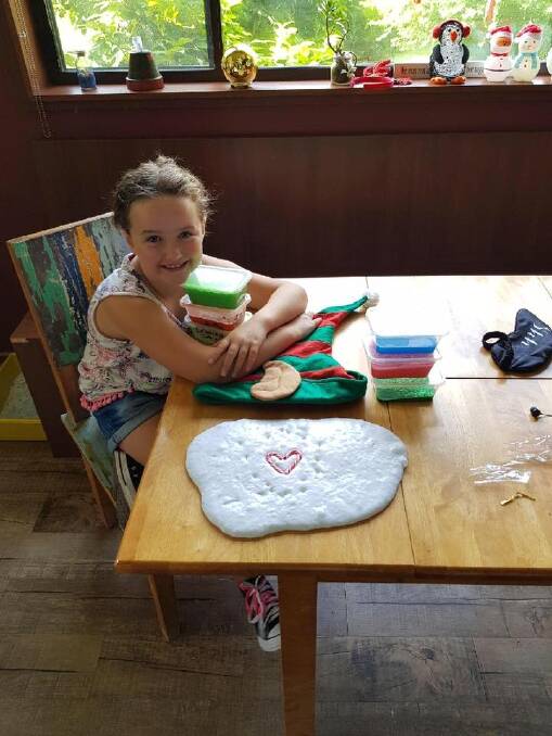 Eight-year-old Tumut girl Una Skein is selling slime at the Southside Farmers Market in Canberra. Photo: Supplied