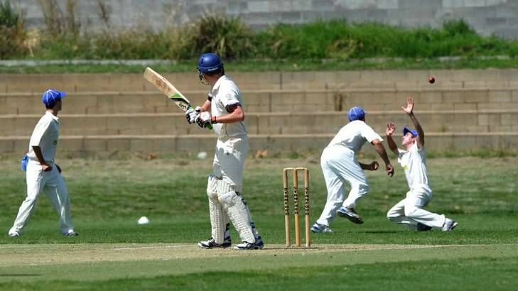 ANU batsman Michael Shafer gets a lucky break with a slips catch going begging against Queanbeyan on Saturday. Photo: Graham Tidy