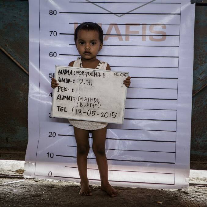 Norfouna, a Rohingya migrant child, poses for identification purposes at a temporary shelter in Indonesia. Photo: Ulet Ifansasti