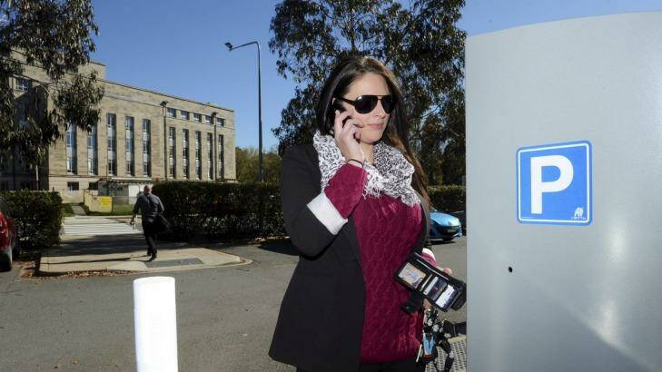 The first day of paid parking caused problems for public servant Emilie Rohan, who was forced to call the help line when the parking machine ate her coins. Photo: Graham Tidy