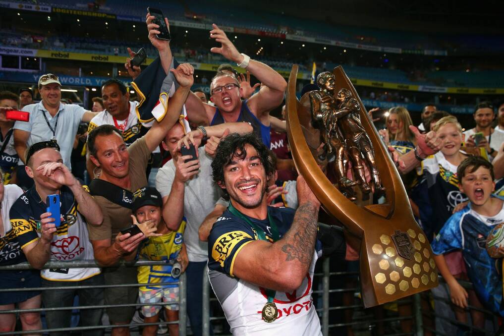 Massive numbers watched Johnathan Thurston's Cowboys carry off the NRL trophy. Photo: Getty Images 
