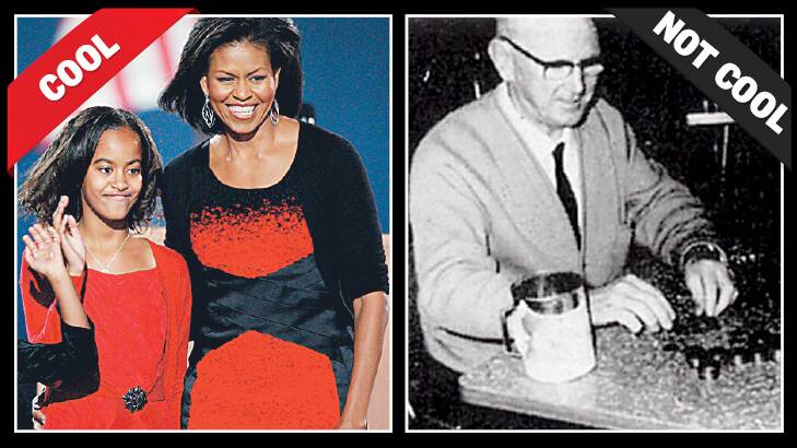 Michelle Obama wears a black cardigan to her husband's presidential victory night in 2006, and an Australian tax officer in 1965 wearing the standard uniform.