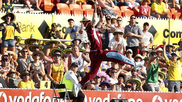 Is it a bird? Is it a plane?  ... No, it’s the Windies’ Kieron Pollard stretching high to dismiss George Bailey at Manuka Oval, Canberra, on Wednesday. Bailey hit 44 runs from 22 balls. Photo: Reuters