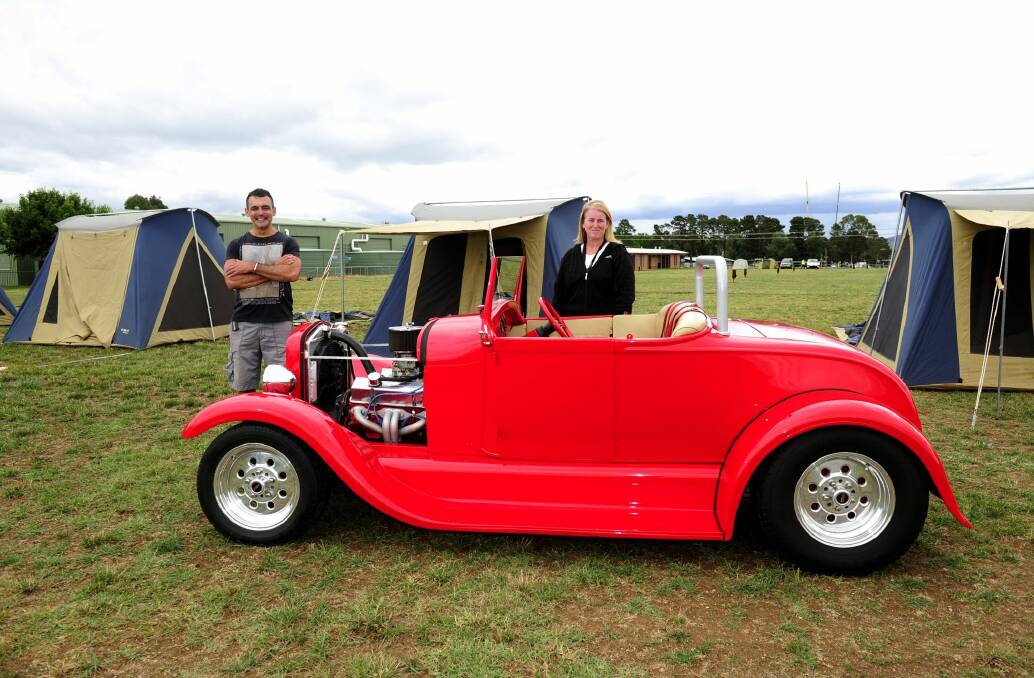 Summernats co-owner Andy Lopez and camping manager Tracy Kennedy admire a 1928 Ford roadster. Photo: Melissa Adams