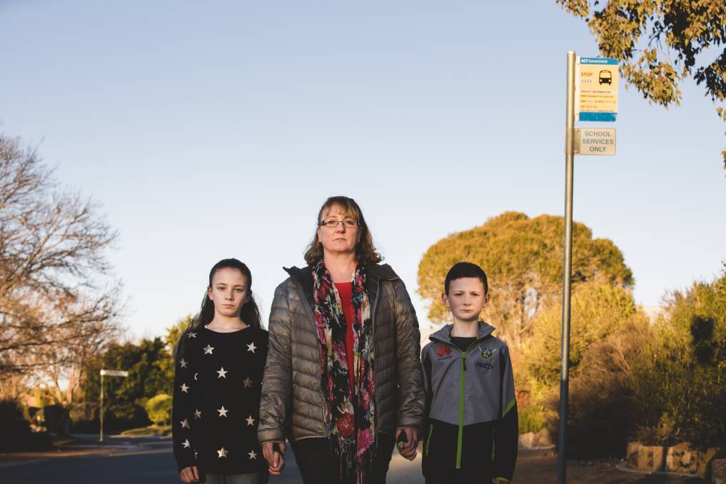 Melanie Wilson says she will have to change her work hours to drive her two children Molly 11, and Ben 8 (right) to school if their neighbourhood loses its dedicated school bus. Photo: Jamila Toderas