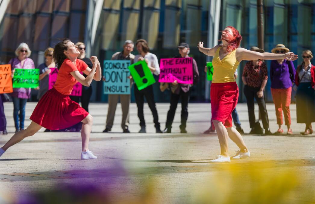Australia Dance Party artistic director Alison Plevey and dancer Olivia Fyfe during a live activist performance petitioning for arts funding outside the ACT Legislative Assembly. Photo: Sitthixay Ditthavong