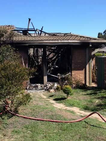 The house at Bural Court in Ngunnawal damaged by fire.