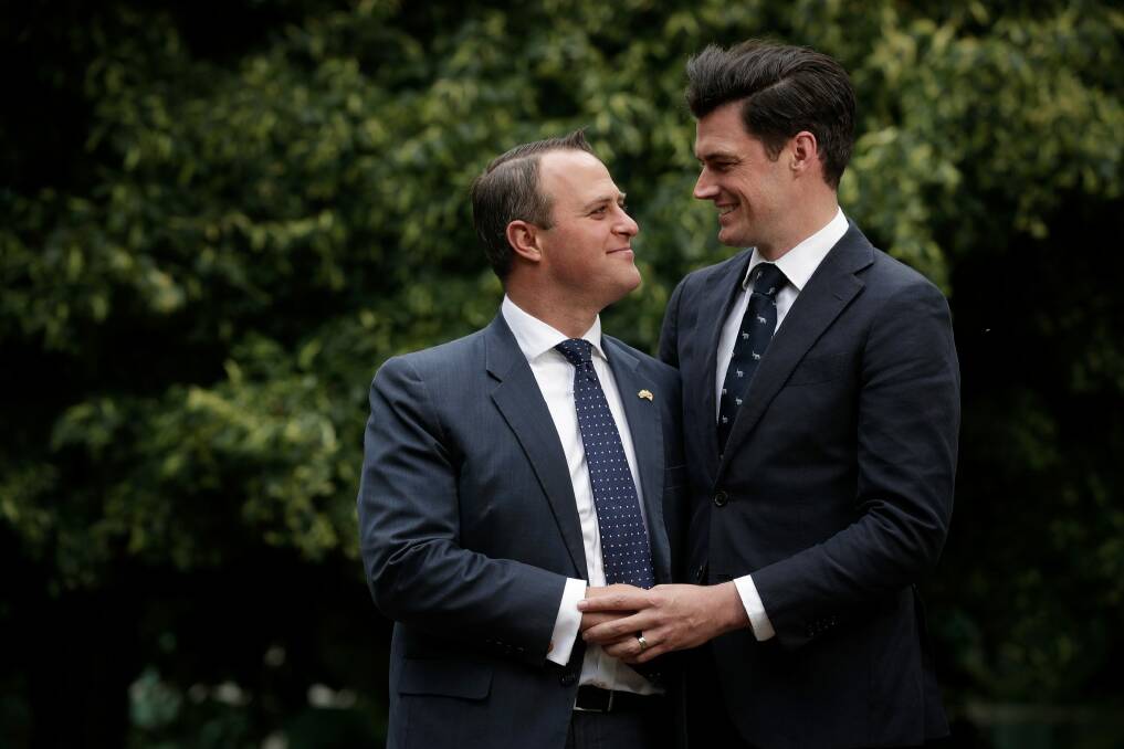Liberal MP Tim Wilson poses for a portrait with his partner, Ryan Bolger, after Mr Wilson proposed. Photo: Alex Ellinghausen