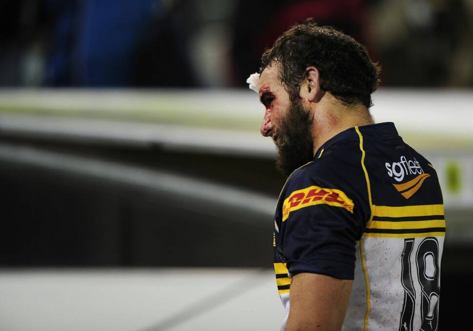 Battle wounds: Scott Fardy heads to the sheds at full-time during a Super Rugby match for the Brumbies against Otago in 2012. Photo: Stuart Walmsley