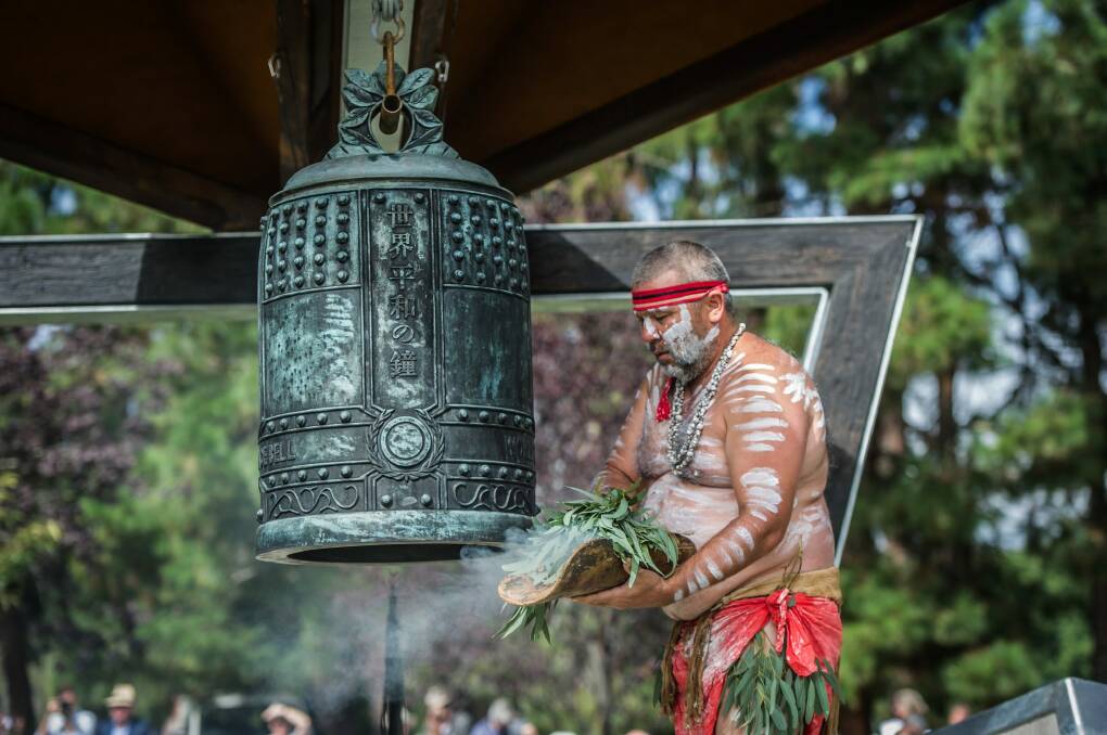 Wiradjuri echoes dancer and elder Duncan Smith welcomes the world peace bell to the Nara Peace Park.  Photo: karleen minney