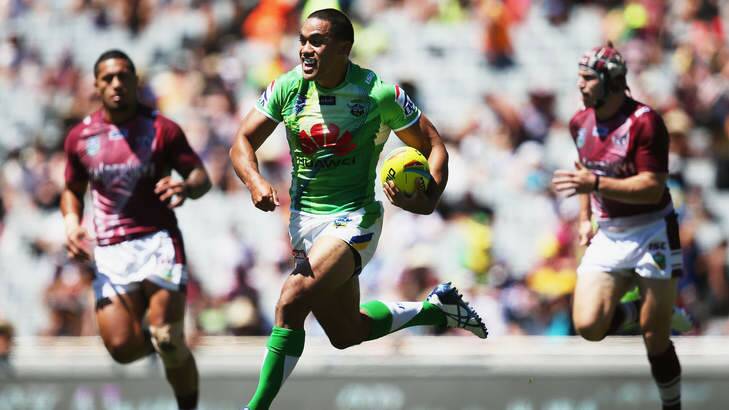 Bill Tupou of the Raiders makes a break to score a try during  the Auckland NRL Nines against Manly.