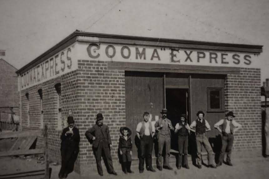 News-hungry staff outside Cooma Express office. Date unknown.