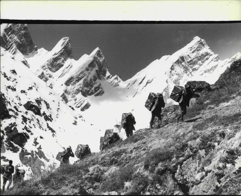 The expedition reaches Changabang, 6,700 metres up on the high road to Dunagiri. The snow peak at right is Kalanka. May 18, 1978. Photo: Fairfax Media
