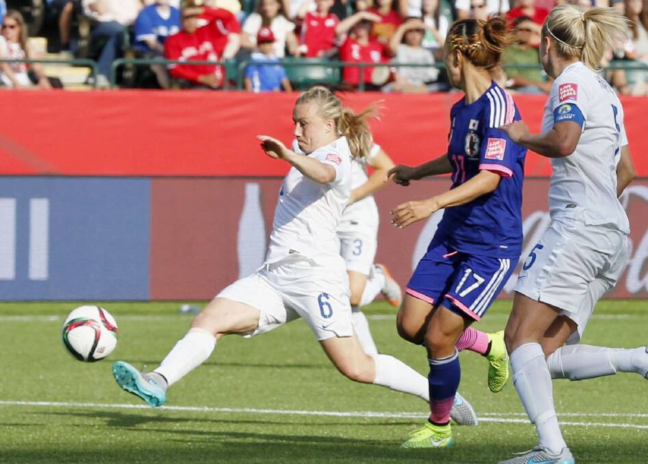 England defender Laura Bassett (6) tries to block a pass during the second half of a Women's World Cup semifinal against Japan in Edmonton, Canada, on July 1, 2015. The ball looped and went in off the underside of the bar, providing Japan a 2-1 victory. Japan will meet the United States in the final for the second tournament in a row. (Kyodo) ==Kyodo England defender Laura Bassett (6) tries to block a pass during the second half of a Women's World Cup semifinal against Japan in Edmonton, Canada, on July 1, 2015. The ball looped and went in off the underside of the bar, providing Japan a 2-1 victory. Japan will meet the United States in the final for the second tournament in a row. (Kyodo) ==Kyodo Photo: AAP