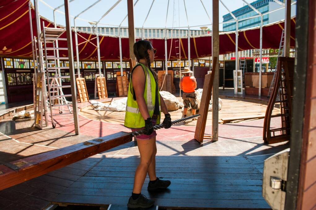 The Famous Spiegeltent's crew work to set it up outside the Canberra Theatre ahead of its opening night on Friday. Photo: Elesa Kurtz