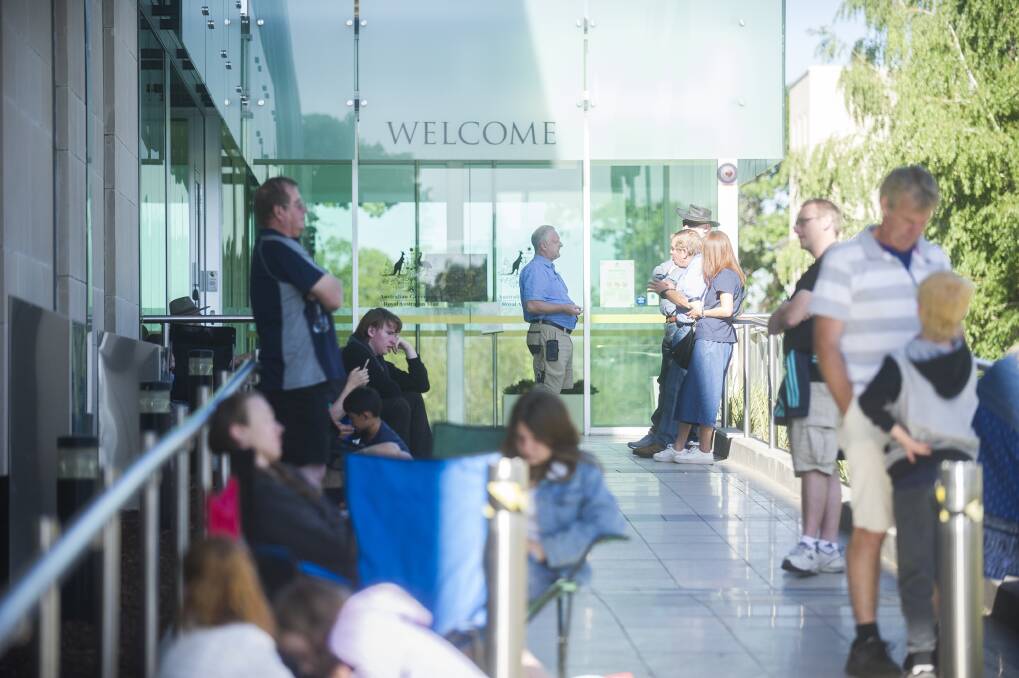 People wait outside the Royal Australian Mint for the first ticket to be pulled for the first coin strike of 2019. Photo: Dion Georgopoulos