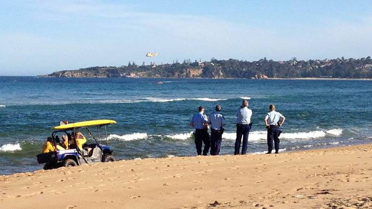 A search at the Bega River mouth,  north of Tathra, for two missing swimmers ended in tragedy. Photo: Ben Smyth