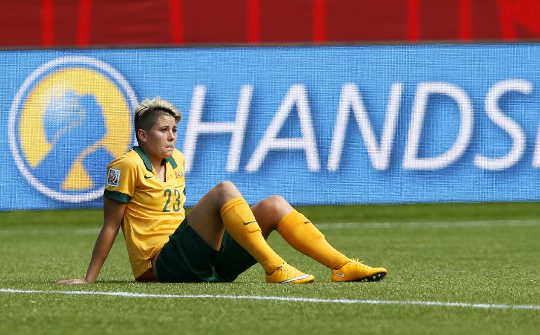 Michelle Heyman reflects after Australia was defeated by Japan in the World Cup quarter-finals.  Photo: Todd Korol 