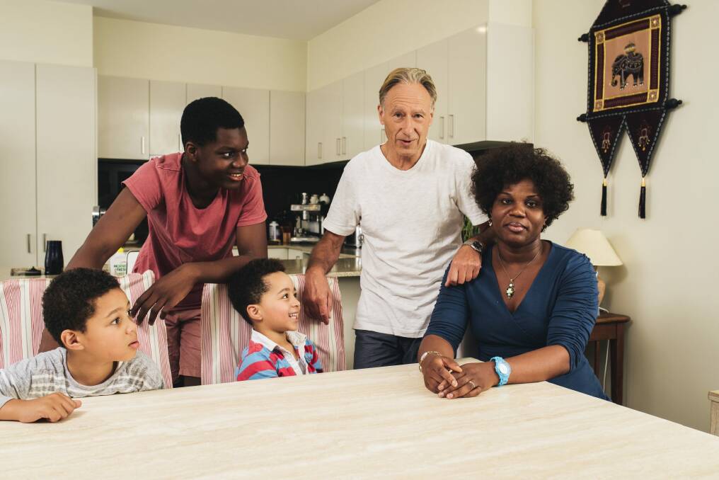 Nefe Levy, right, with her husband Richard, and children, Tega Adegbite, and Charles and Amaury Levy. Nefe works in family daycare. Photo: Rohan Thomson