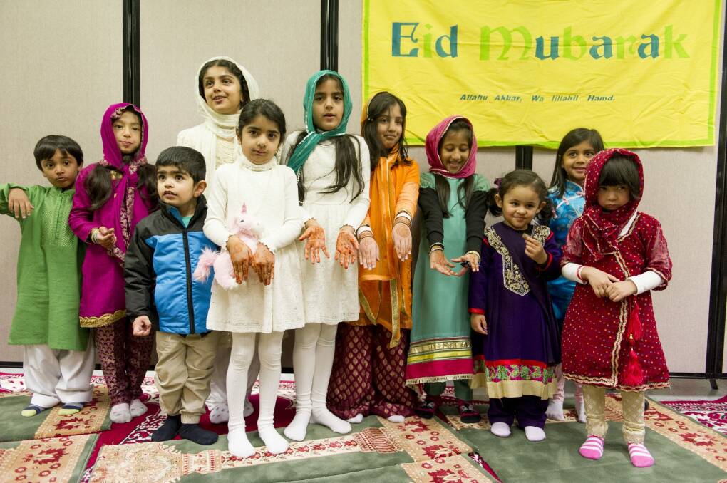 Ahmadiyya Muslim children are all dressed up for Eid. Photo: Jay Cronan