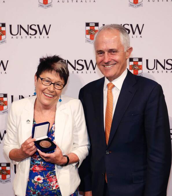 Canberra's Kim Ryan, presented with the inaugural Australian Mental Health Prize by Prime Minister Malcolm Turnbull. Ms Ryan is the CEO of the Australian College of Mental Health Nurses. Photo: Contributed