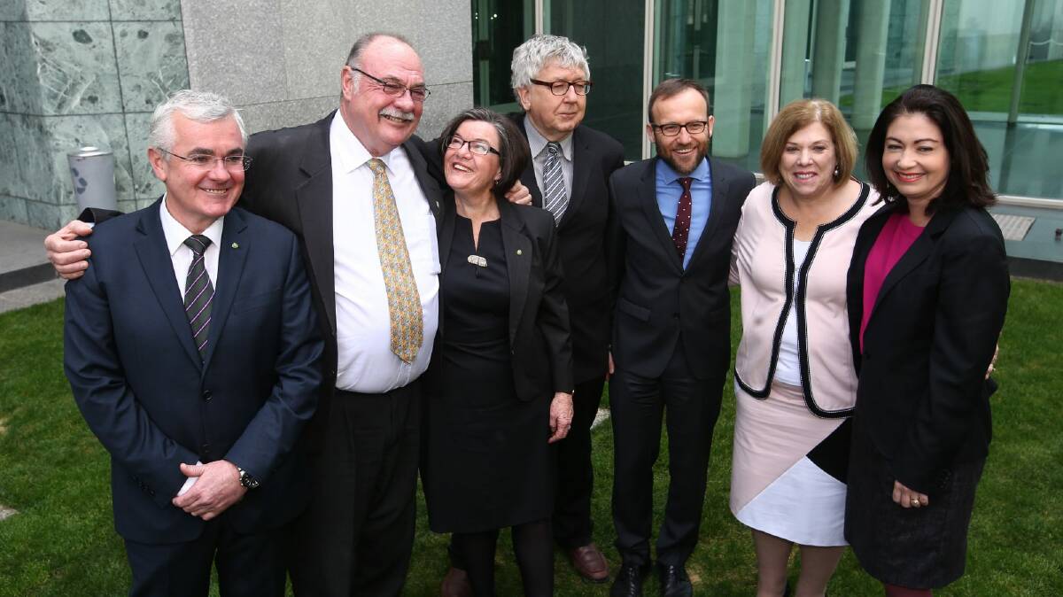 Warren Entsch with other MPs after he introduced a private member's bill on marriage equality with co-sponsers Andrew Wilkie, Cathy McGowan, Laurie Ferguson, Adam Bandt, Teresa Gambaro and Terri Butler. Photo: Andrew Meares